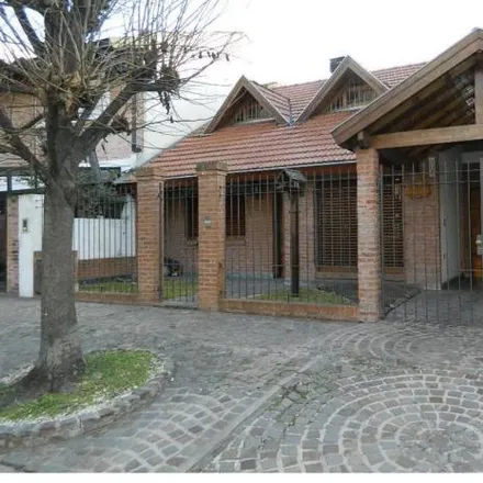 Buy this 3 bed house on 1008 - Aviador Curtis 7001 in Partido de Tres de Febrero, 1687 Ciudad Jardín Lomas del Palomar