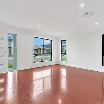 Rent this 4 bed apartment on Kingsdale Avenue in Catherine Field NSW 2557, Australia