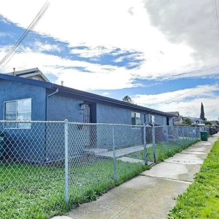 Buy this 4 bed house on 1162;1164 91st Avenue in Oakland, CA 94621