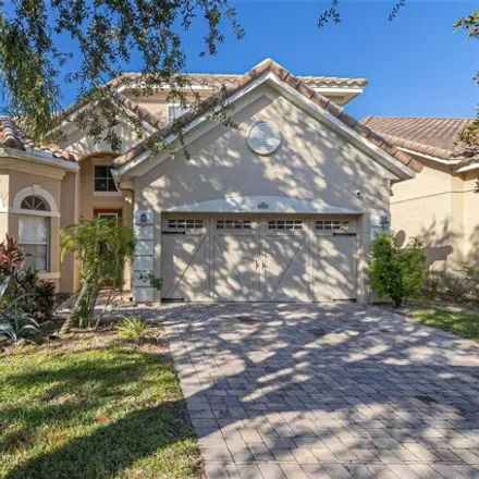 Rent this 4 bed house on Dolce Way in Orlando, FL 32819