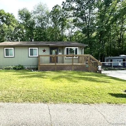 Buy this 3 bed house on 398 Harpham Street in Commerce Charter Township, MI 48382