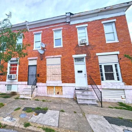 Buy this 3 bed townhouse on 1411 North Montford Avenue in Baltimore, MD 21213