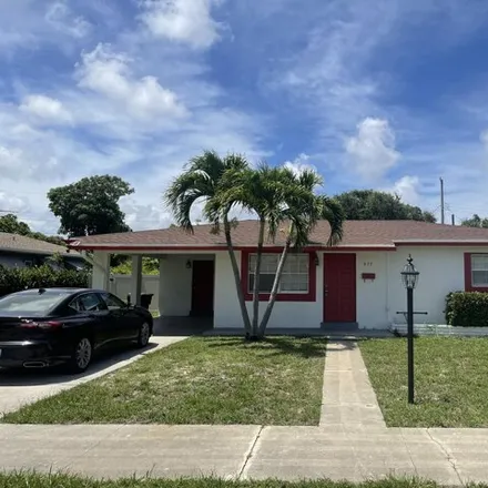 Rent this 3 bed house on 443 Bayberry Drive in Lake Park, Palm Beach County