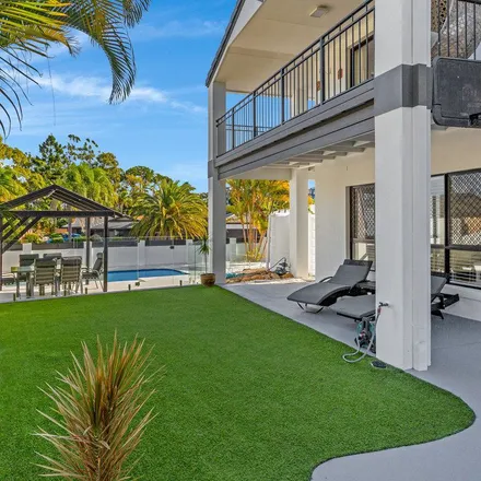 Rent this 5 bed apartment on 24 Beaconsfield Drive in Burleigh Waters QLD 4220, Australia
