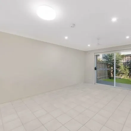 Rent this 3 bed apartment on Mellish Parade in Glenfield NSW 2167, Australia