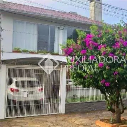 Buy this 4 bed house on Rua Pedro Waine in Santa Maria Goretti, Porto Alegre - RS