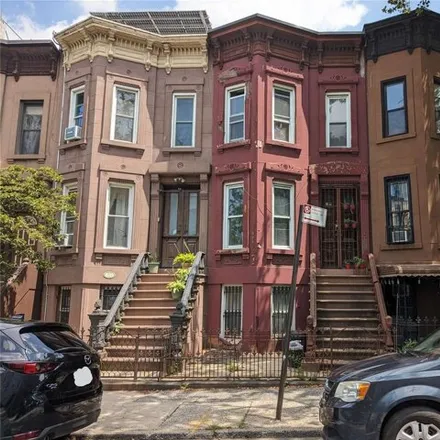 Buy this 4 bed house on 649 Degraw Street in New York, NY 11217