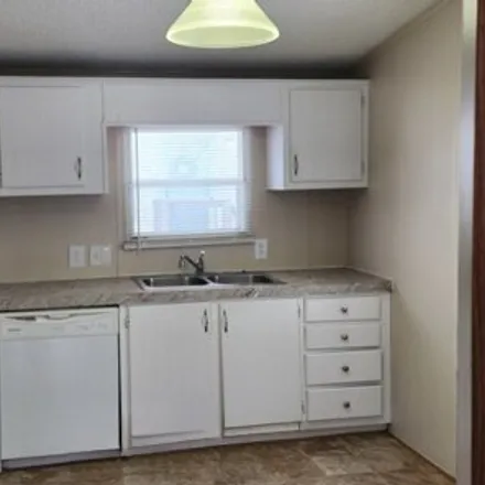 Buy this studio apartment on Canterbury Trail in Bath Charter Township, MI 48808