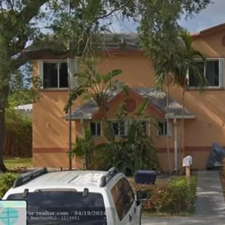 Rent this 2 bed townhouse on 2261 Northeast 171st Street in North Miami Beach, FL 33160