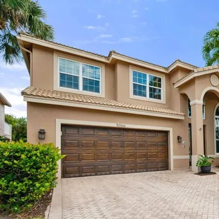Buy this 4 bed house on 5066 Greenwich Preserve Ct in Boynton Beach, Florida