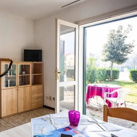 Rent this 3 bed townhouse on Italy in Via Meteore 2, 30028 Bibione VE