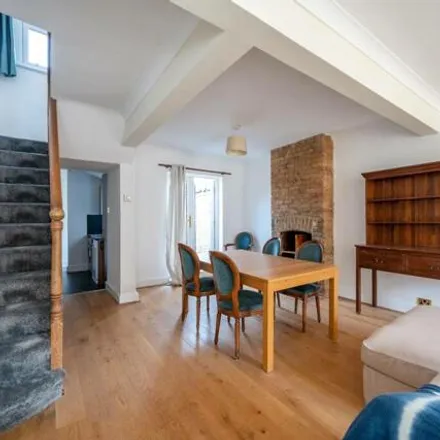Rent this 3 bed townhouse on Newton Road in London, SW19 3PH