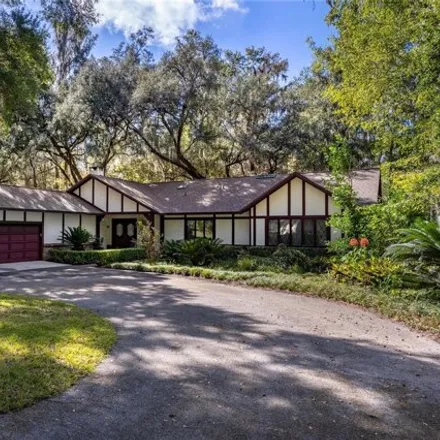 Buy this 4 bed house on 11298 Creek Drive West in Alachua, FL 32615