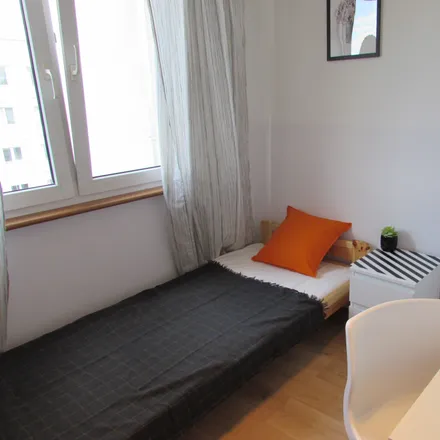 Rent this 4 bed room on Aleja Niepodległości 24/30 in 02-653 Warsaw, Poland