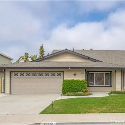 Rent this 4 bed house on 20412 Venus Circle in Huntington Beach, CA 92646