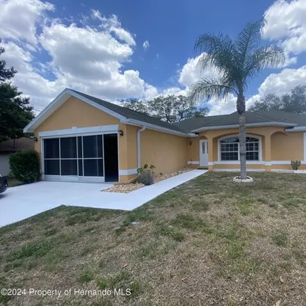 Rent this 3 bed house on 4163 Everett Ave in Spring Hill, Florida