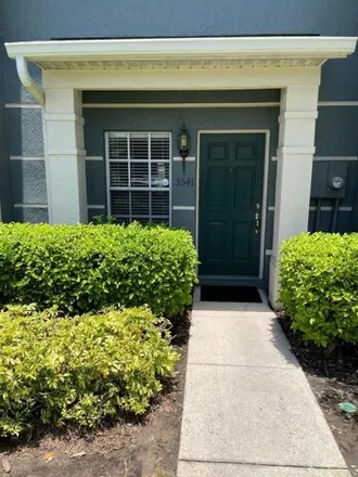 Rent this 2 bed townhouse on 3541 Wilshire Way Rd Unit 54 in Orlando, Florida