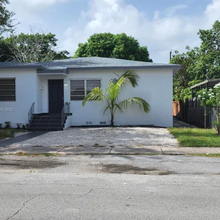 Buy this 4 bed house on 3056 Southwest 13th Street in Silver Court Trailer Park, Miami