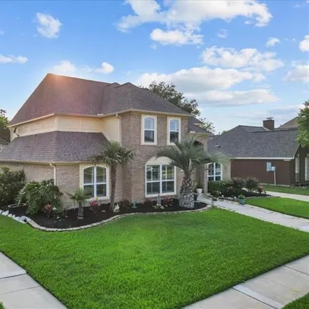 Buy this 4 bed house on Pebble Beach Drive in League City, TX 77573