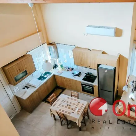 Rent this 3 bed apartment on Odos Rodon Adiezodos in Artemida Municipal Unit, Greece