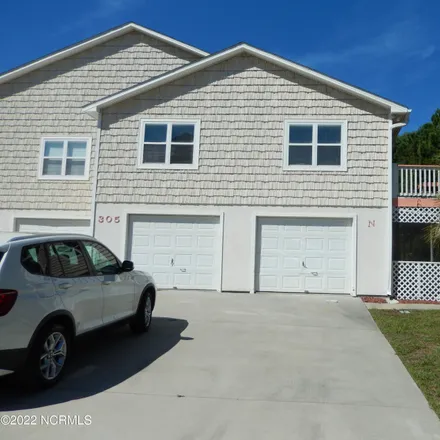 Buy this 3 bed townhouse on 305 Osprey Ridge Drive in Pebble Beach, Emerald Isle