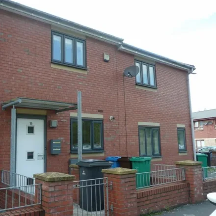 Rent this 2 bed townhouse on 18 Leaf Street in Manchester, M15 5LE