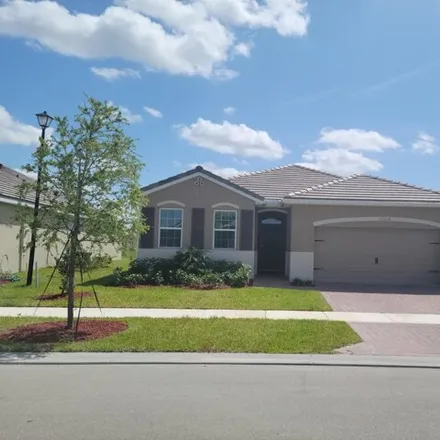 Rent this 3 bed house on Southwest Arabella Drive in Port Saint Lucie, FL 34987