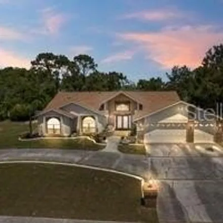 Buy this 4 bed house on 13323 Bruni Drive in Spring Hill, FL 34609