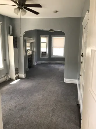 Rent this 3 bed house on 3435 South Wood Street in Chicago, IL 60609