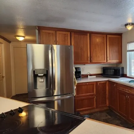 Buy this studio apartment on 55847 Swan Road in Three Rivers, Deschutes County