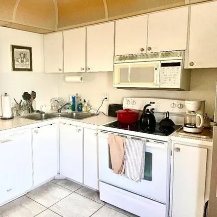 Rent this 2 bed condo on 400 Paradise Isle Boulevard in Golden Isles, Hallandale Beach