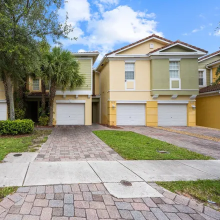 Buy this 3 bed townhouse on 1019 Pipers Cay in Palm Beach County, FL 33415