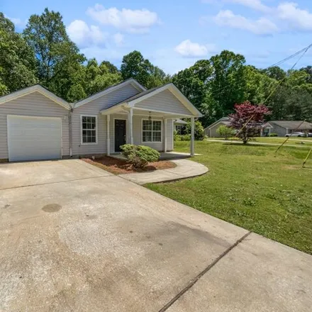 Buy this 3 bed house on 1967 Faith Cove in Clayton County, GA 30349