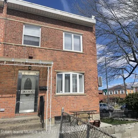 Buy this 4 bed house on 153-47 58th Road in New York, NY 11355