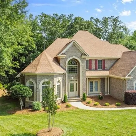 Buy this 5 bed house on 5885 Four Wood Dr in Matthews, North Carolina