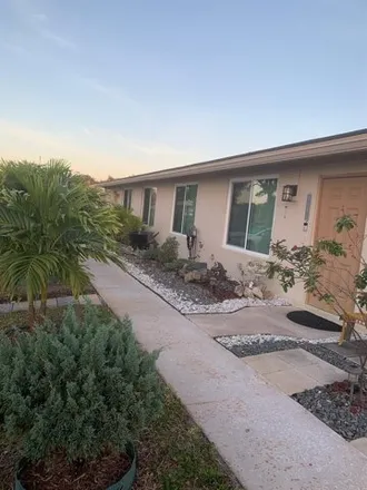 Rent this 3 bed townhouse on 8004 Southwest 20th Place in Pine Island, FL 33324