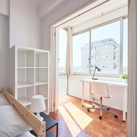 Rent this 8 bed room on LSB-00027 in Rua Conde de Almoster, 1500-197 Lisbon