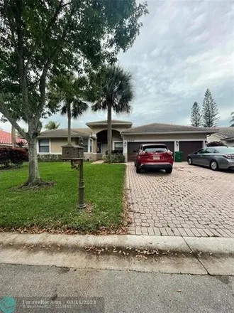 Rent this 4 bed house on Northwest 65th Avenue in Coral Springs, FL 33067