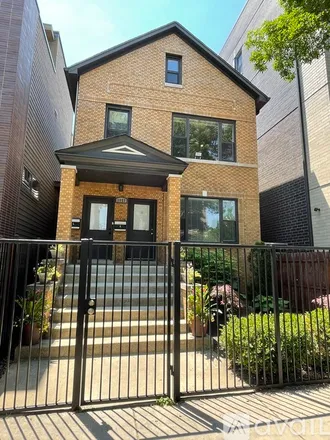 Rent this 3 bed duplex on 1957 W Erie St