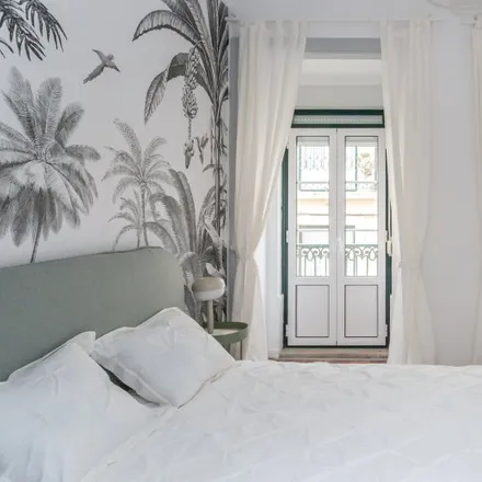 Rent this 6 bed room on Rua da Esperança do Cardal in 1150-326 Lisbon, Portugal
