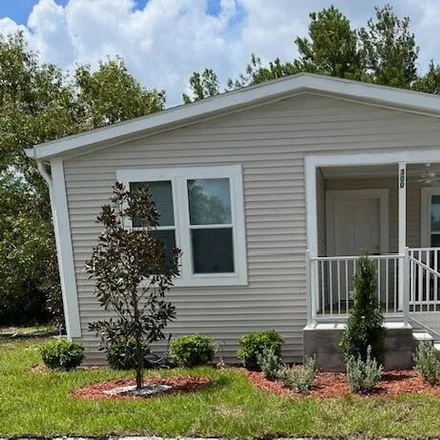 Buy this 2 bed house on 300 Raintree Circle in DeLand, FL 32724