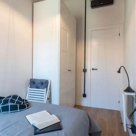 Rent this 4 bed apartment on Carrer de l'Encarnació in 08001 Barcelona, Spain