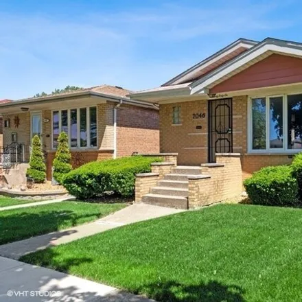 Buy this 3 bed house on 7046 West 63rd Place in Chicago, IL 60638