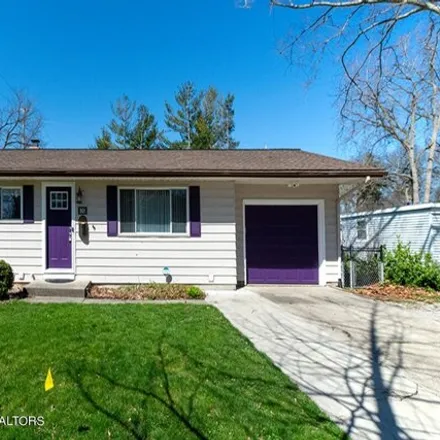 Buy this 4 bed house on 1391 Beech Street in East Lansing, MI 48823