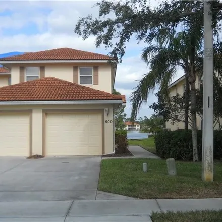 Rent this 2 bed condo on 472 Robin Hood Circle in Collier County, FL 34104
