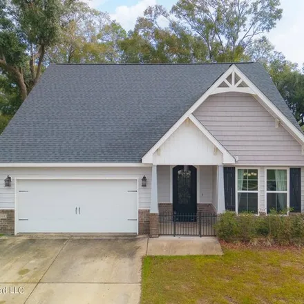 Buy this 4 bed house on 14060 Plantation Oaks Drive in Gulfport, MS 39503