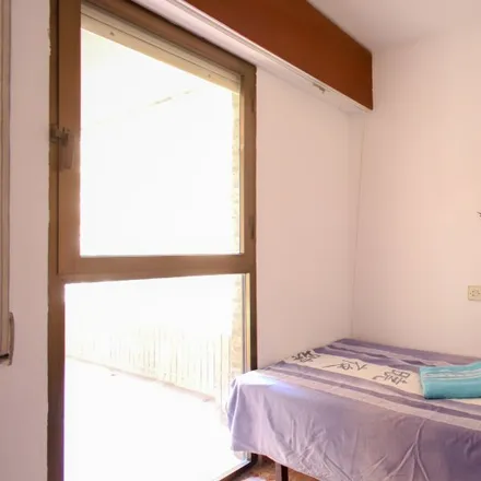 Rent this 4 bed room on Passatge del Cartellista Rafael Raga in 46021 Valencia, Spain