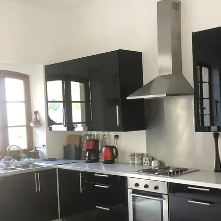 Rent this 6 bed townhouse on 11120 Bize-Minervois