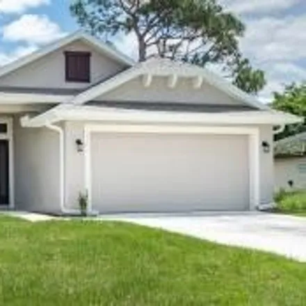 Buy this 4 bed house on 1398 Defender Street Northwest in Palm Bay, FL 32907