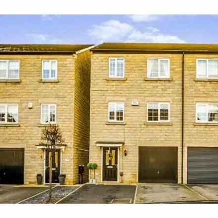 Buy this 4 bed townhouse on Pugneys Avenue in Crigglestone, WF4 3FT